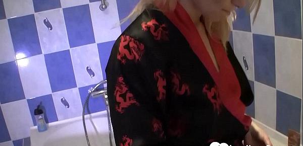 Blonde bangable stepmom fingers herself in the shower